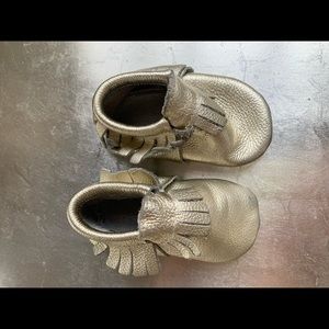 Gold Leather Moccasins.